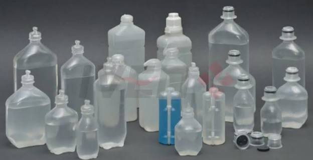 Clear intravenous fluid bottles
