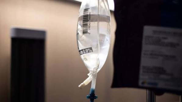Intravenous fluid bag on a drip